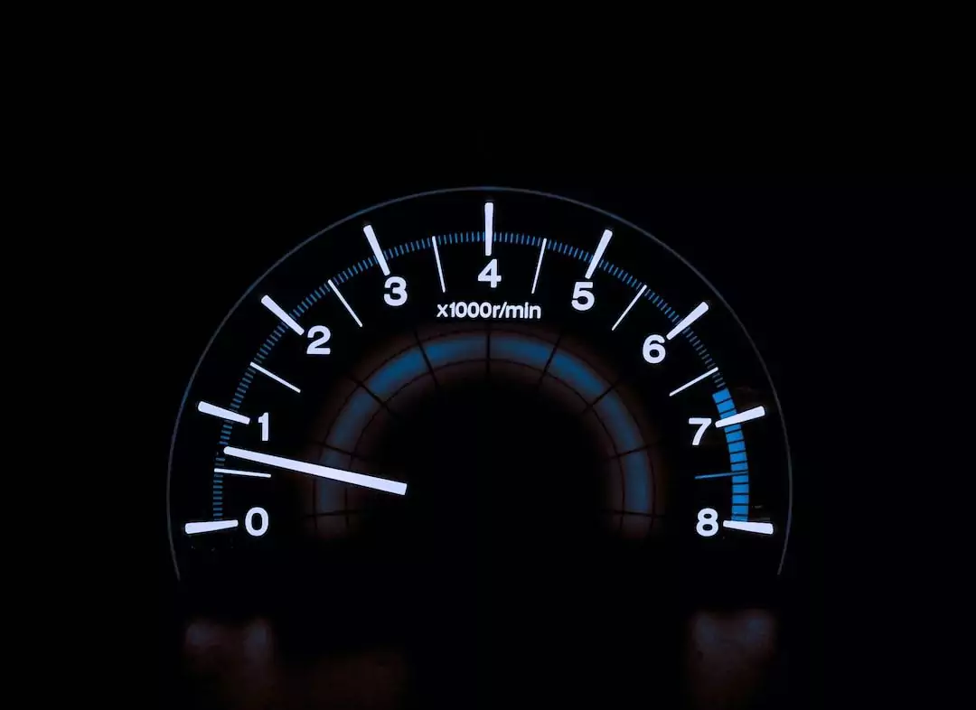 A close-up view of an automobile tachometer displaying RPM, with the needle pointing at approximately 1,000 RPM—vital information often reviewed by a car accident lawyer when investigating a collision for legal assistance.
